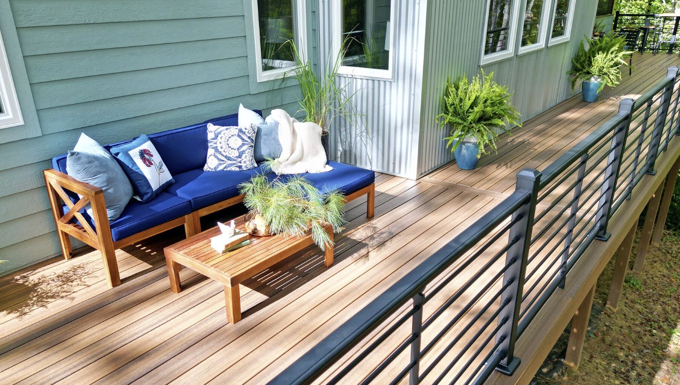 Outdoor deck with multiple functional zones including dining and lounging areas